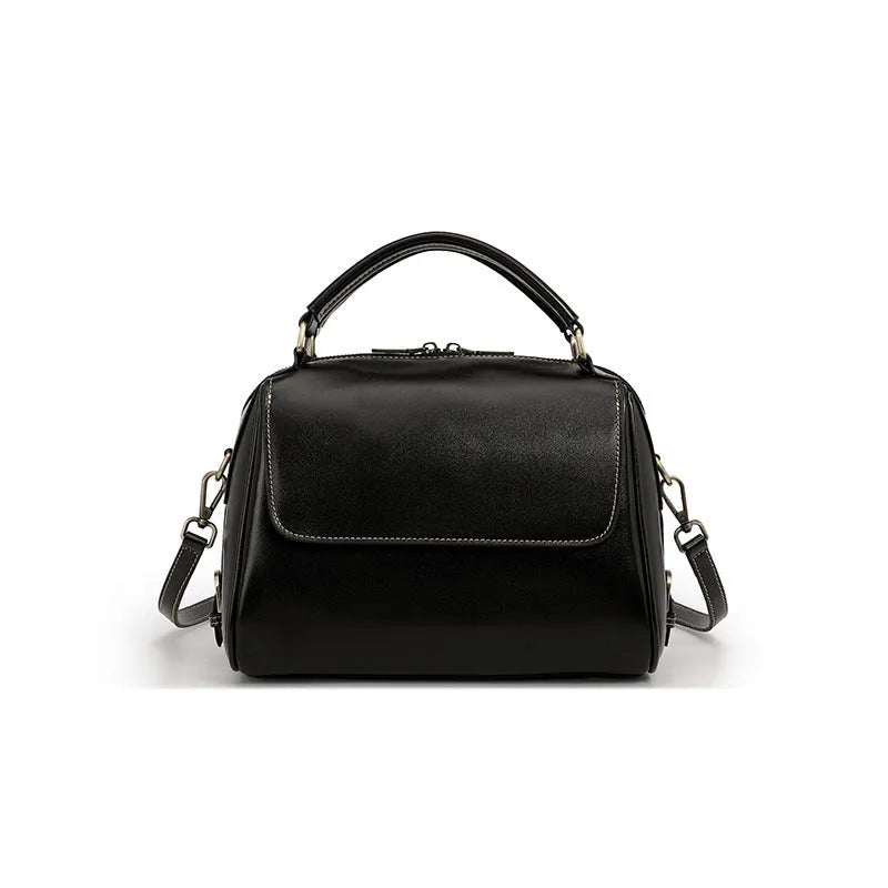 Women's soft genuine leather crossbody tote bag in a square shape with a double strap, shown in apricot colour.