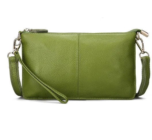 Lady cowhide slant bag in apricot showing top layer leather texture and dual straps