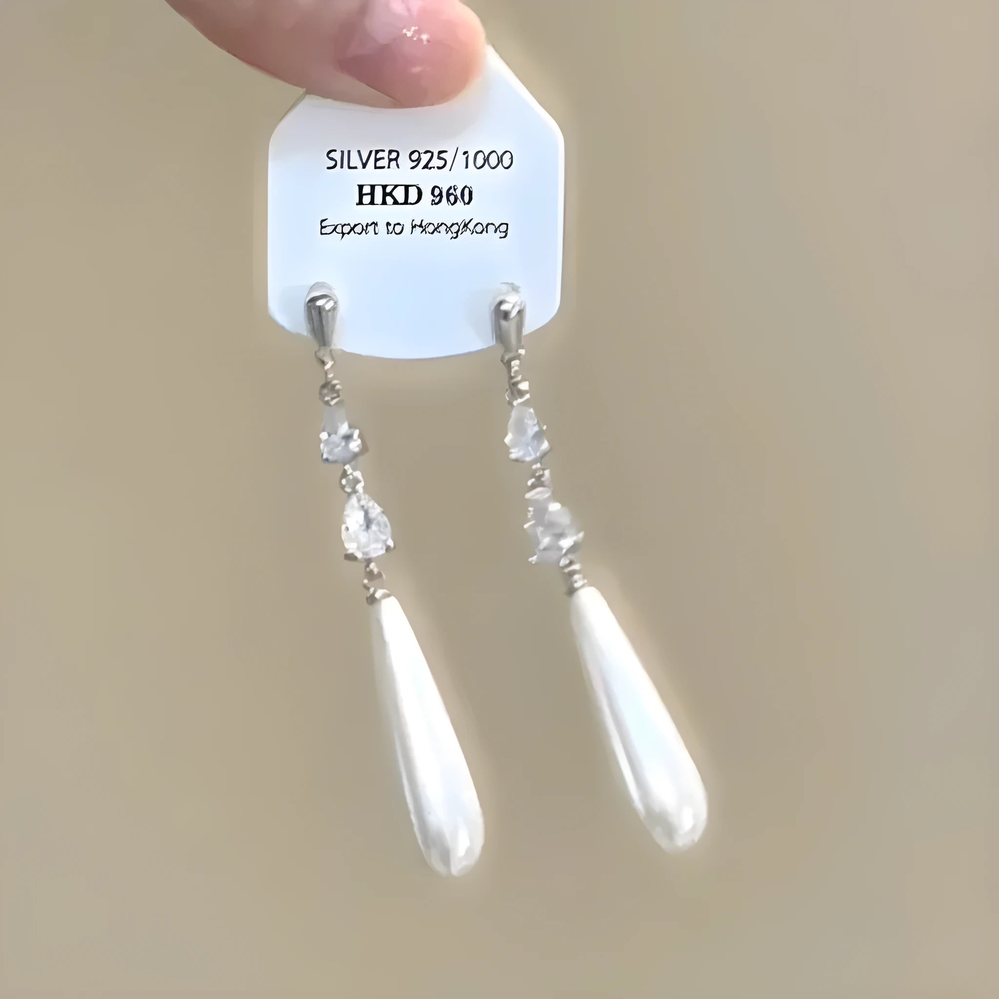 Women's geometric alloy ear clips with rhinestone decoration, star motifs, heart elements, and tassel details