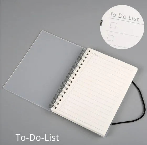 Plastic cover bound spiral coil notebook with cream paper pages and elastic rope closure in A5 size