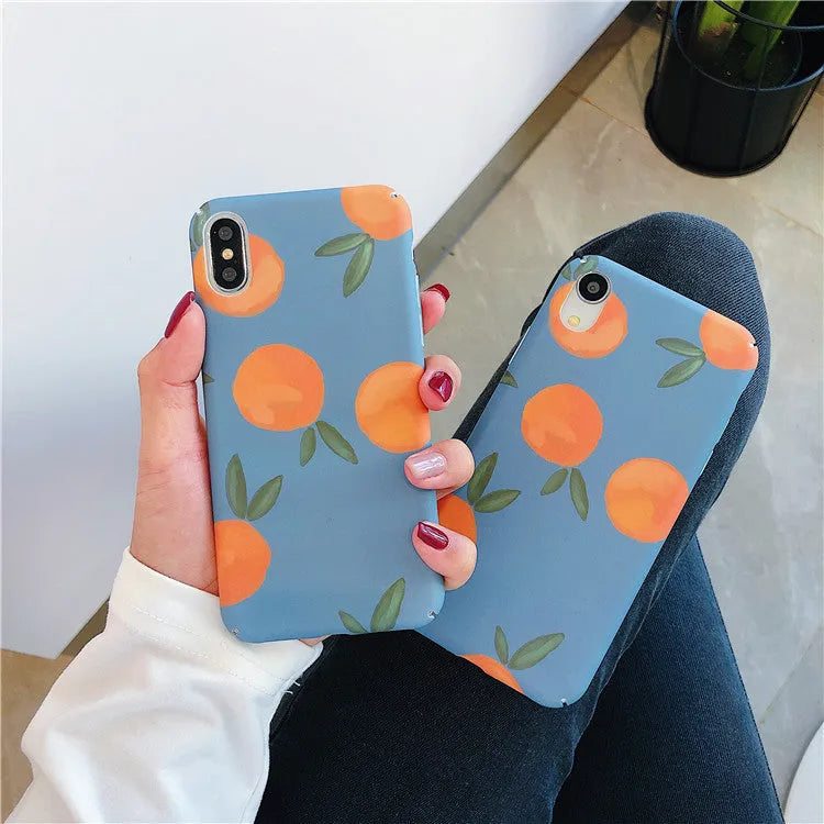Orange retro plastic iPhone back cover with blue and water background design.