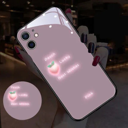 White luminous phone case with painted daisy design for Apple iPhone, showing voice-activated light feature.