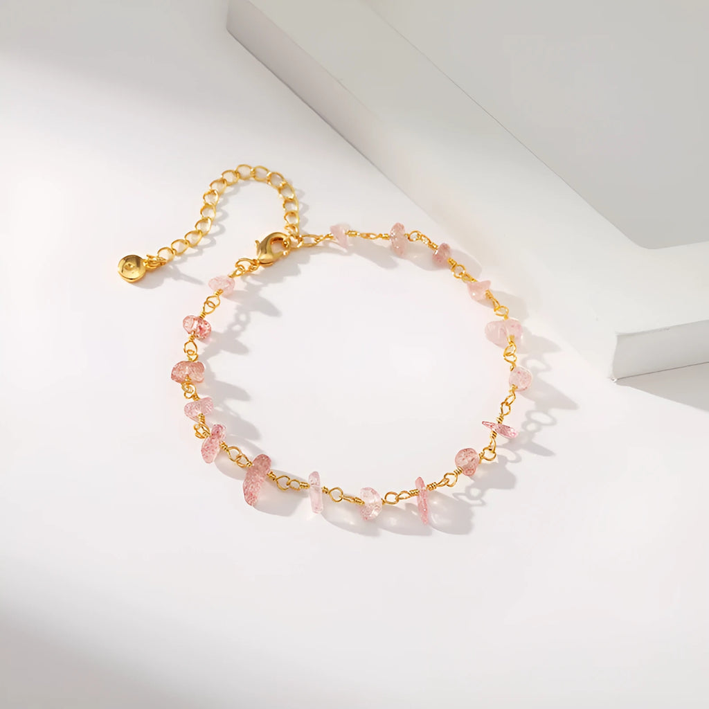 Geometric women's bracelet with natural gravel turquoise stones and crystal accents on gold plated copper.