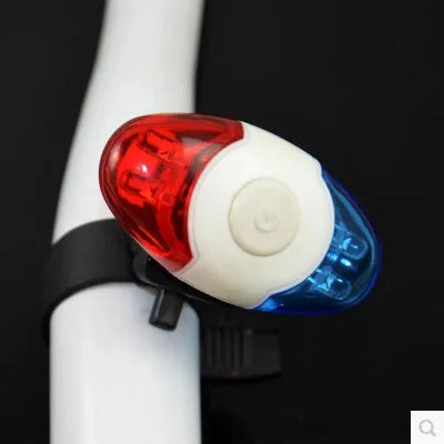 Red and blue LED bicycle tail light with adjustable mounting base showing horizontal and vertical positioning options