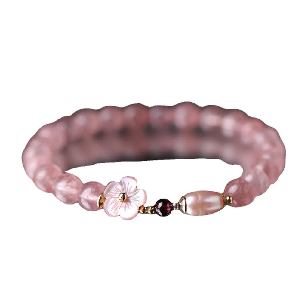 Strawberry quartz peach blossom crystal bracelet with flower-shaped beads on elastic cord