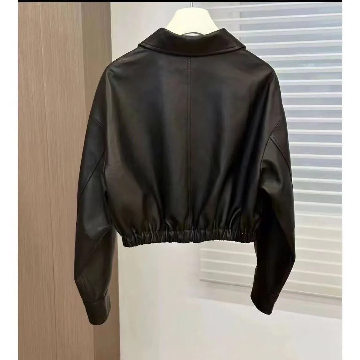 Black womens imitation leather square-neck zip jacket with princess sleeves