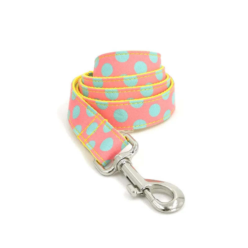 Yellow polka dot dog lead and collar set made of polyester with hand-holding rope design
