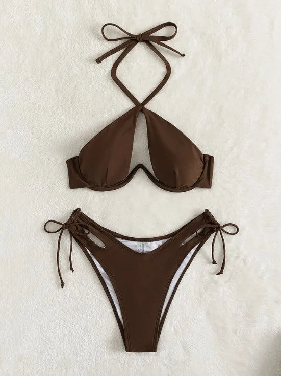 Women's halter neck bikini swimsuit in solid colour with backless design