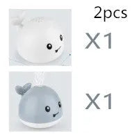 Automatic water spray whale bath toy with colourful LED lights floating in baby bath