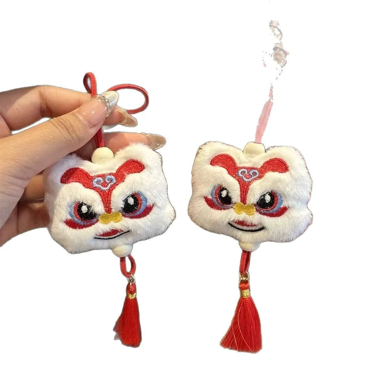 Chinese style plush lion keychain ornament with star stone details in blue or yellow colour