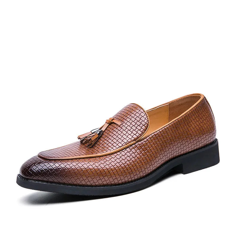 Men's black pointed slip-on business shoes with tassel detail on artificial PU leather upper