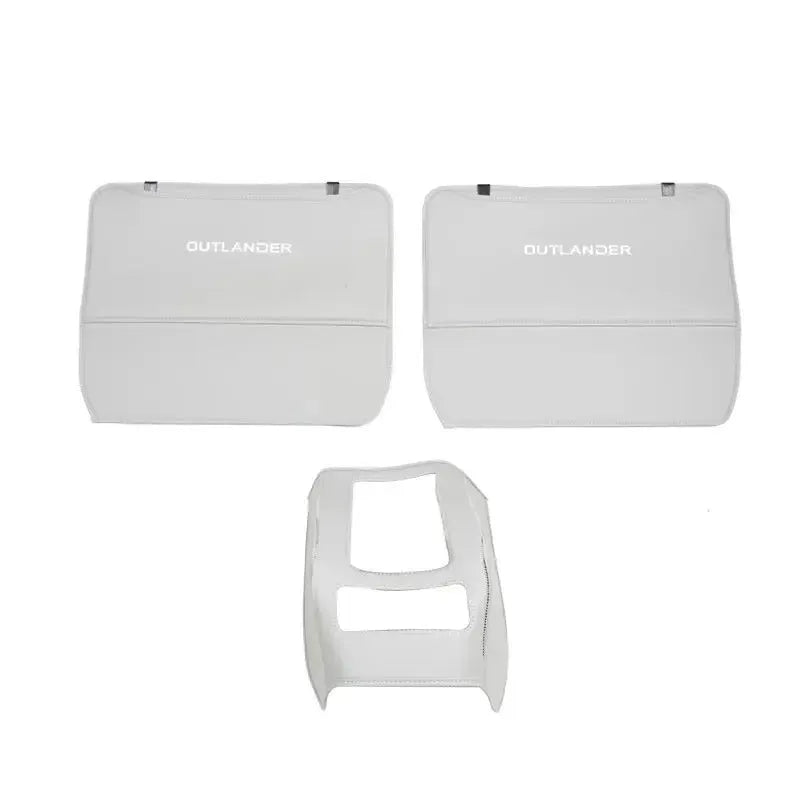 Three leather anti-kick pads for 2023 Outlander interior protection in black, grey, and brown colour options