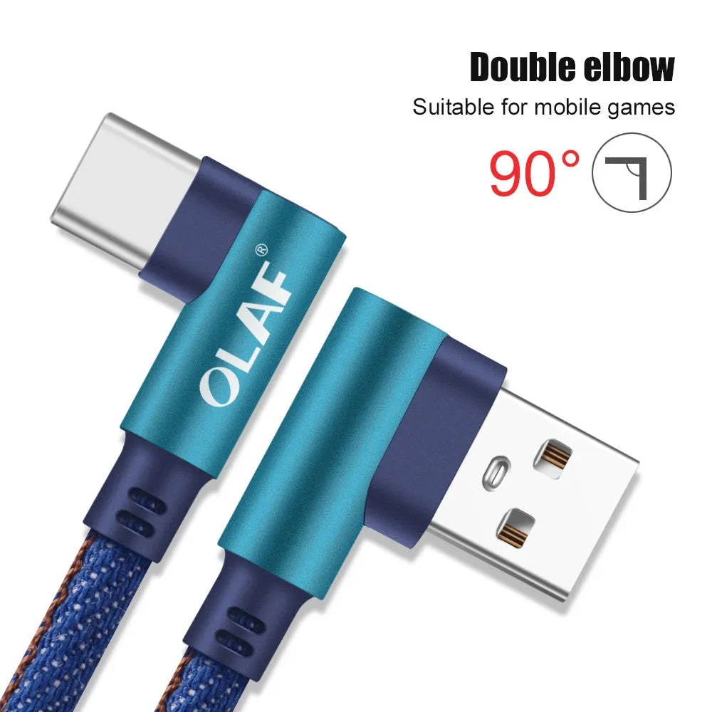 Fast charging USB cable with denim textile exterior and aluminium connectors in black, blue, and red.