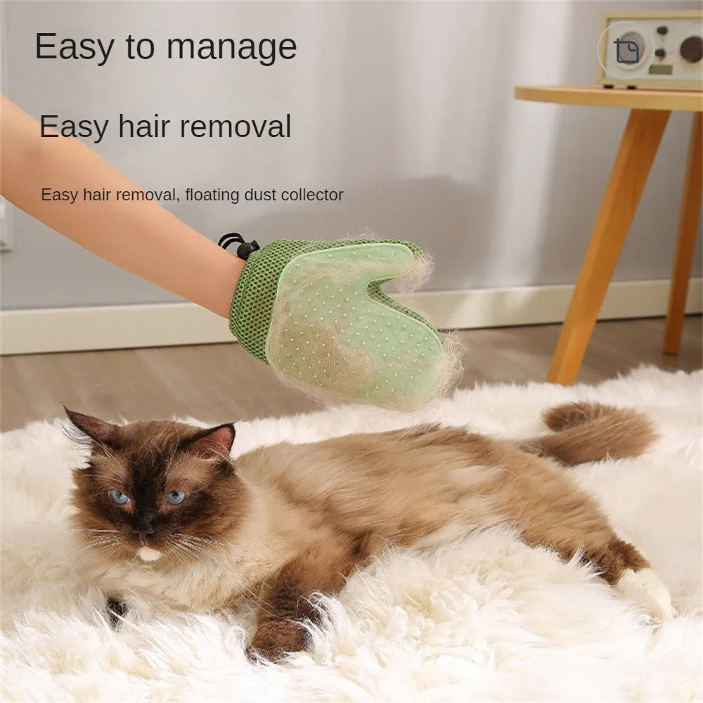 Dark blue pet hair removal glove with mesh surface for grooming dogs and cats and cleaning furniture.