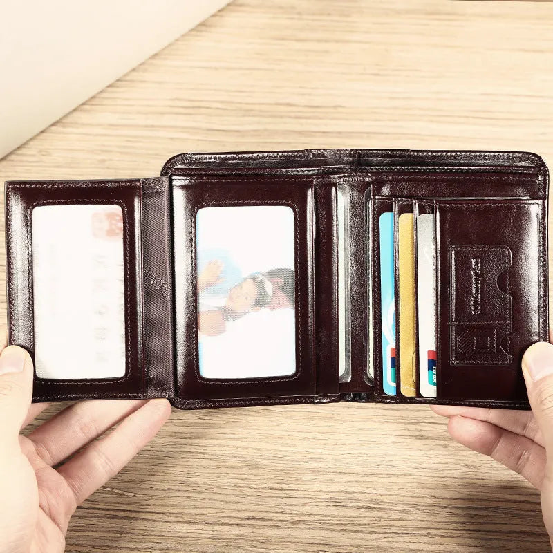 Men's leather wallet showing internal organisation compartments for cards, cash and coins
