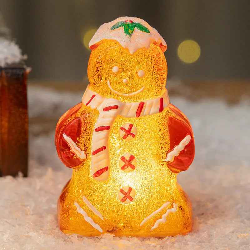 Set of four glowing Christmas gingerbread man and snowman ornaments with different coloured scarves on a festive background.