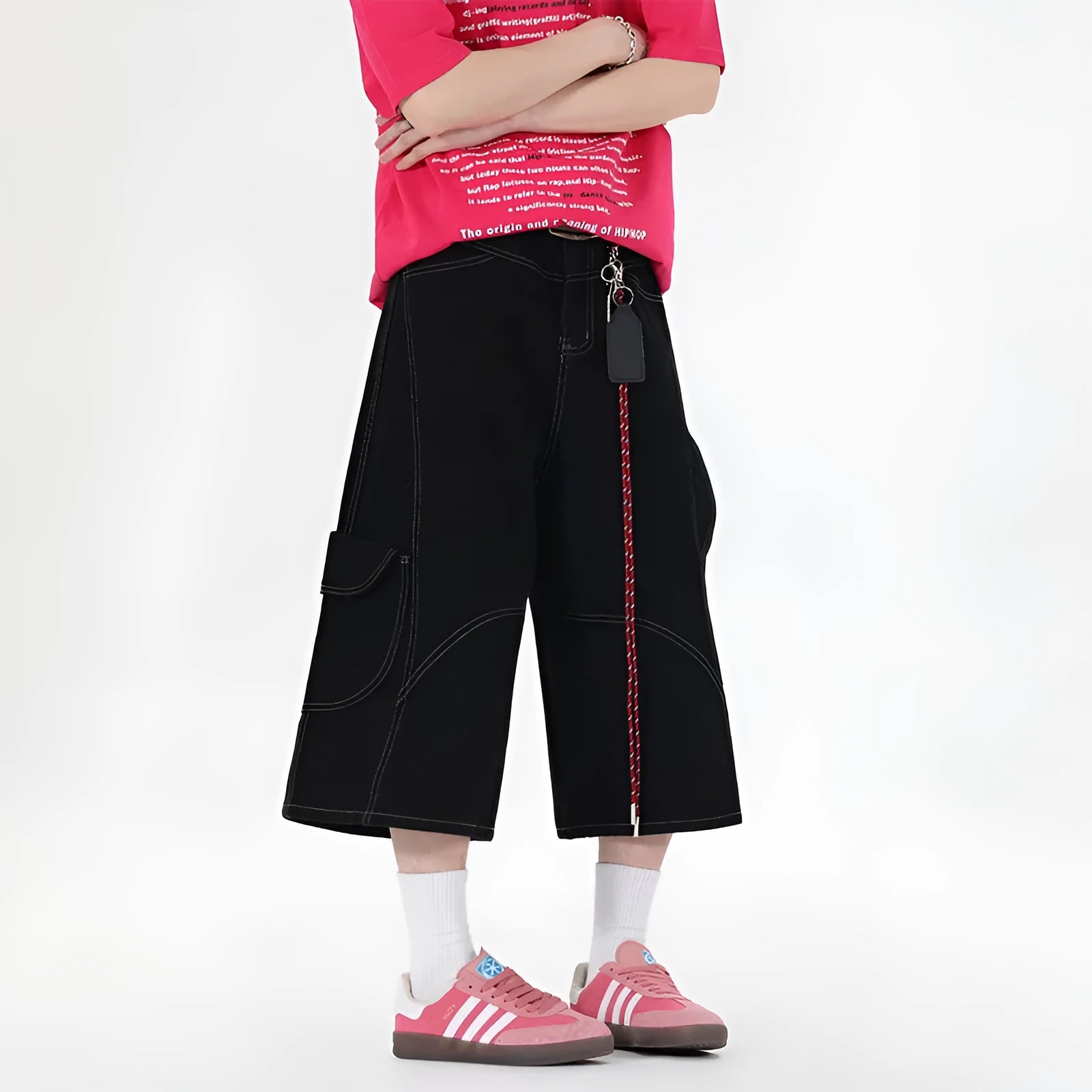 Retro denim multi-pocket workwear shorts in a wide leg cropped style, shown in red and black.