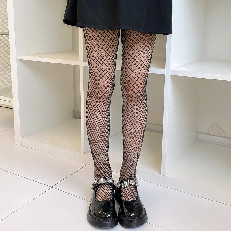 Women's black and white mesh pattern tights showing large, medium, and small net designs for summer.