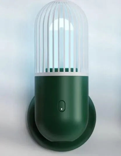 Portable capsule ultraviolet disinfection lamp in black, brown, green or white with display showing 52x52x136mm dimensions