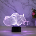 3D illusion dog desktop lamp showing colour changing options including red, green, blue, yellow, cyan, purple, and white