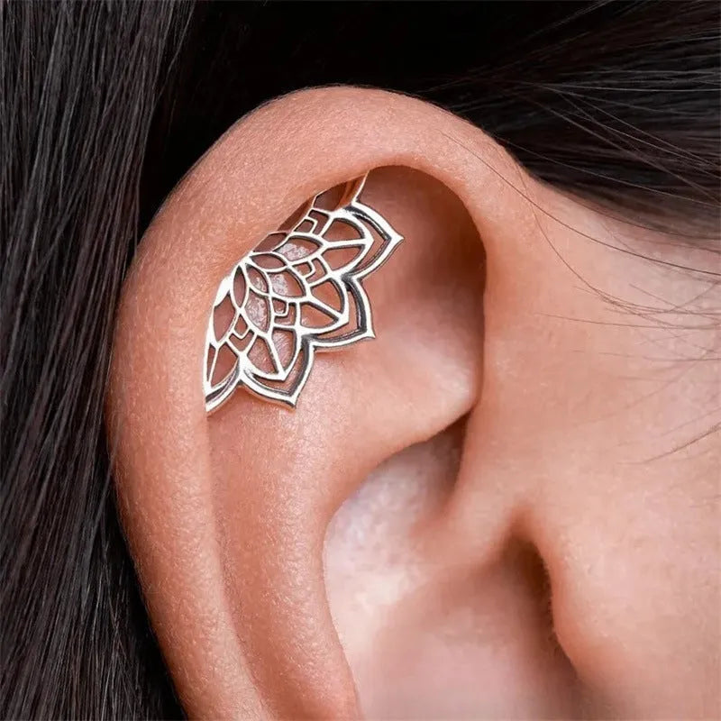 Geometric spider web stud earrings with mesh design in electroplated gold or silver metal finish.