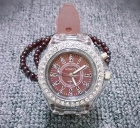 Women's LED luminous quartz watch with round 43mm dial on a silicone strap