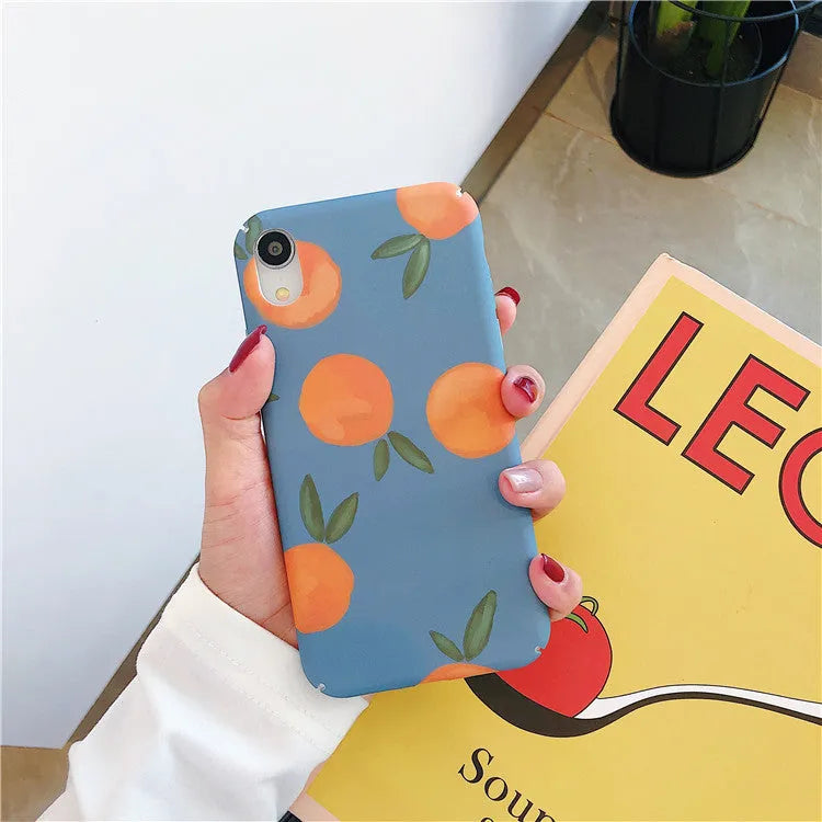 Orange retro plastic iPhone back cover with blue and water background design.