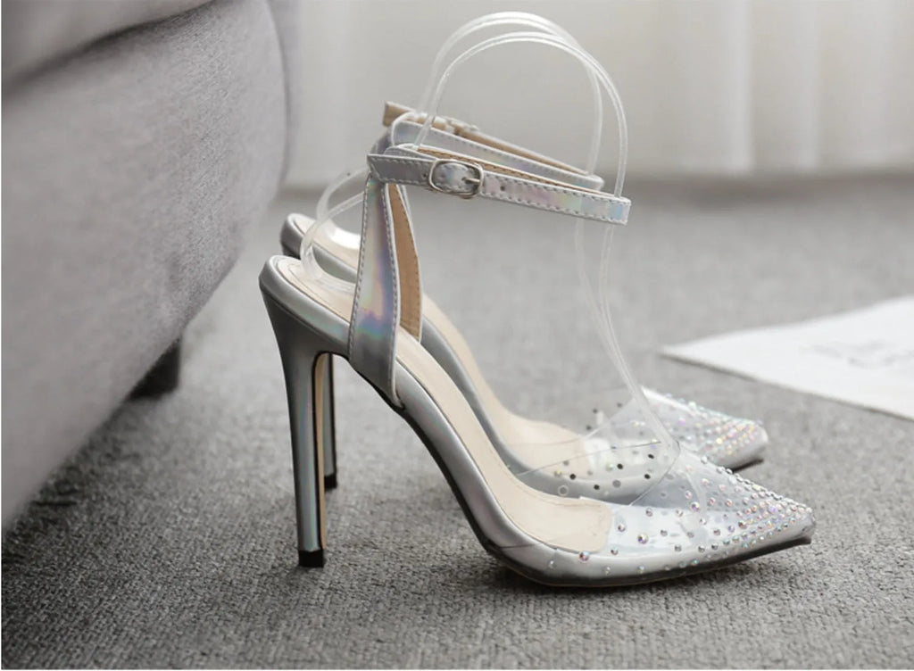Women's pointed toe diamond sandals with stiletto heels on a white background.
