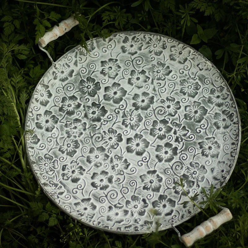 Round wrought iron metal storage tray in two sizes for jewellery and home organisation.