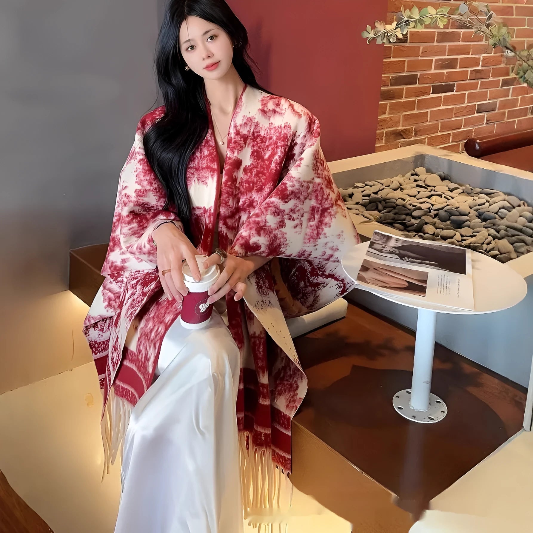 Women's polyester scarf cape with tassel edges in shawl style, shown in one of five available colours