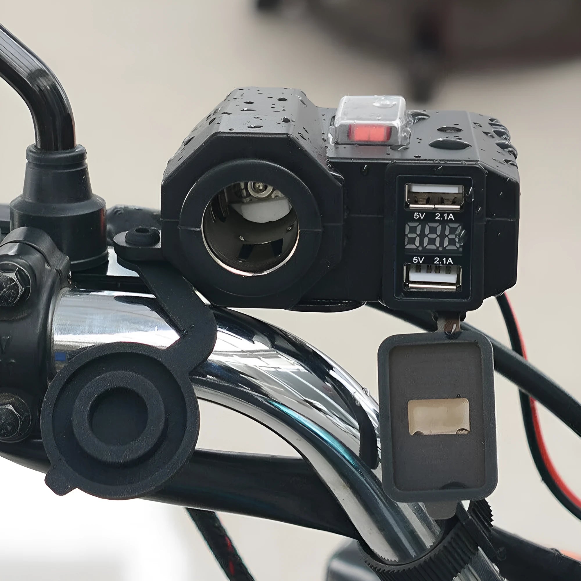Black dual USB waterproof motorcycle charger with voltmeter mounted on handlebar