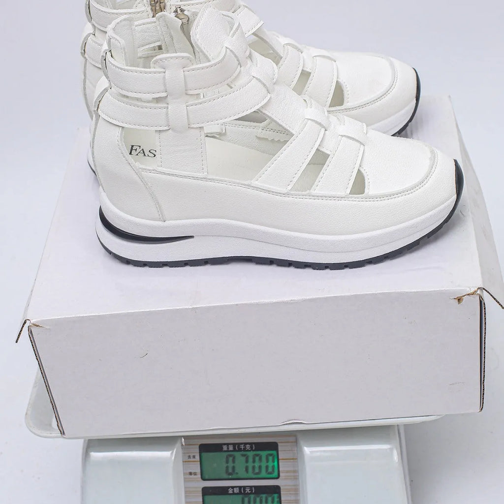Women's black close-toed hollow-out platform sandals with velcro fastening