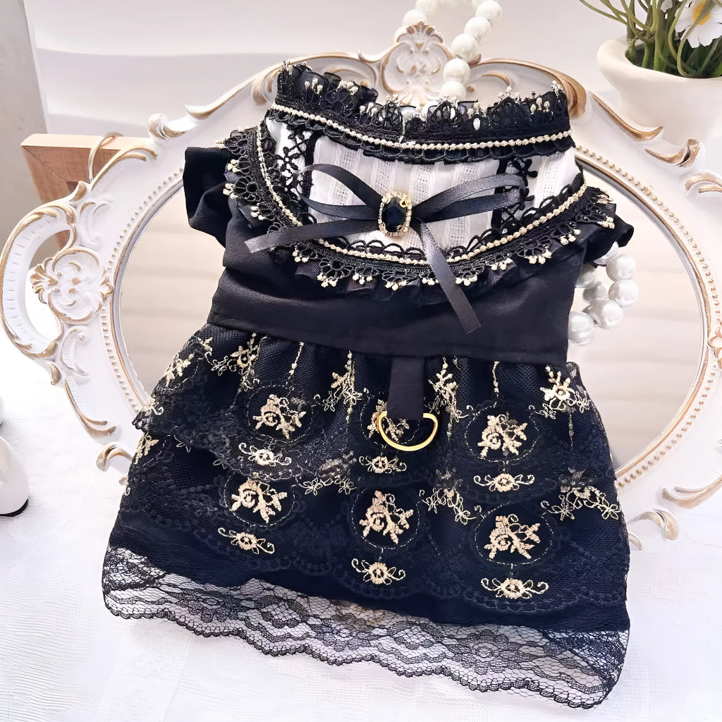 Golden gothic lolita-style skirt costume on a small dog, showing princess design.