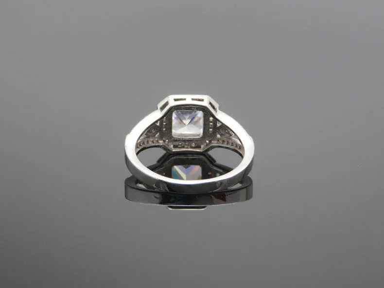 Women's geometric hollow zircon ring with platinum colour finish and quadrilateral design