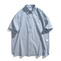 Blue striped short-sleeved cardigan-style shirt with loose fit and cotton blend fabric