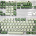 124 PBT keycaps in Matcha green colour arranged by language layout for mechanical keyboards