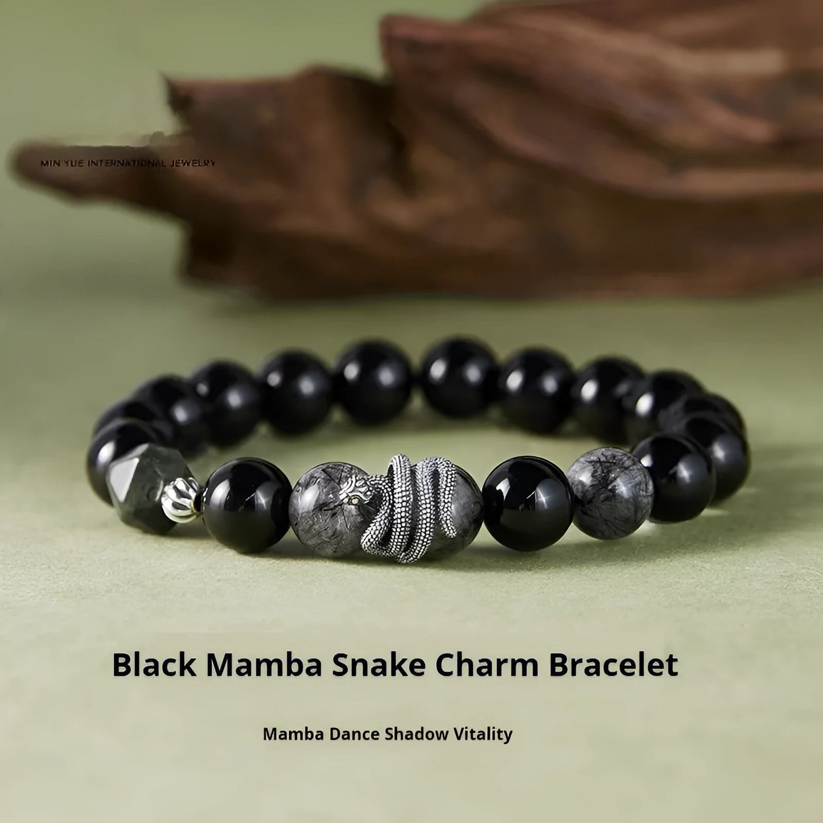 Men's sterling silver bracelet with black obsidian crystal snake charm in retro animal zodiac design