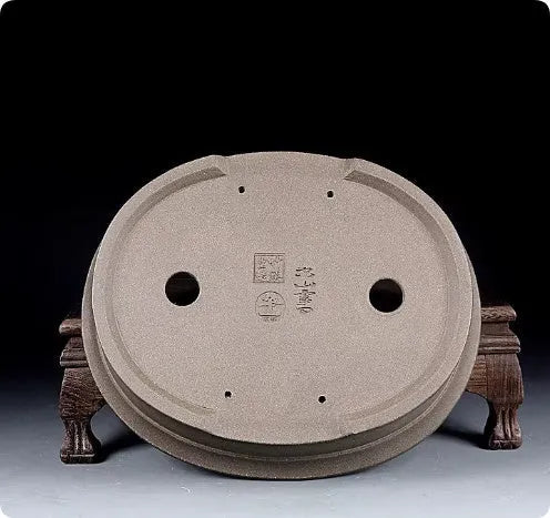 Handmade purple sand clay bonsai pot with antique oval design measuring 25x21x6.3cm
