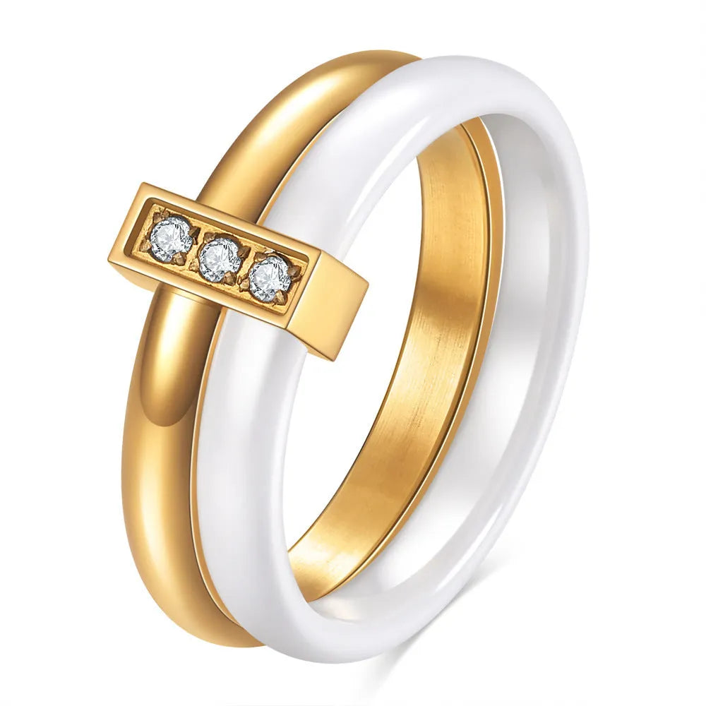 Ceramic women's ring with glossy stitching and zirconium accents in steel black or golden white, 6mm width