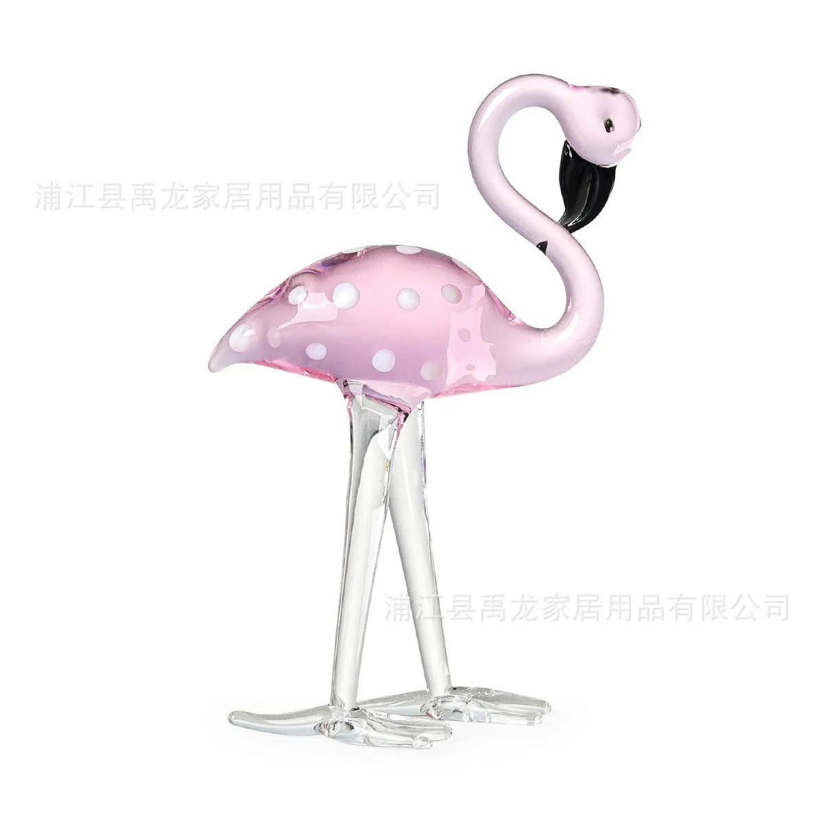Pink crystal flamingo decorative ornament on table, available in separate or parallel styles.
