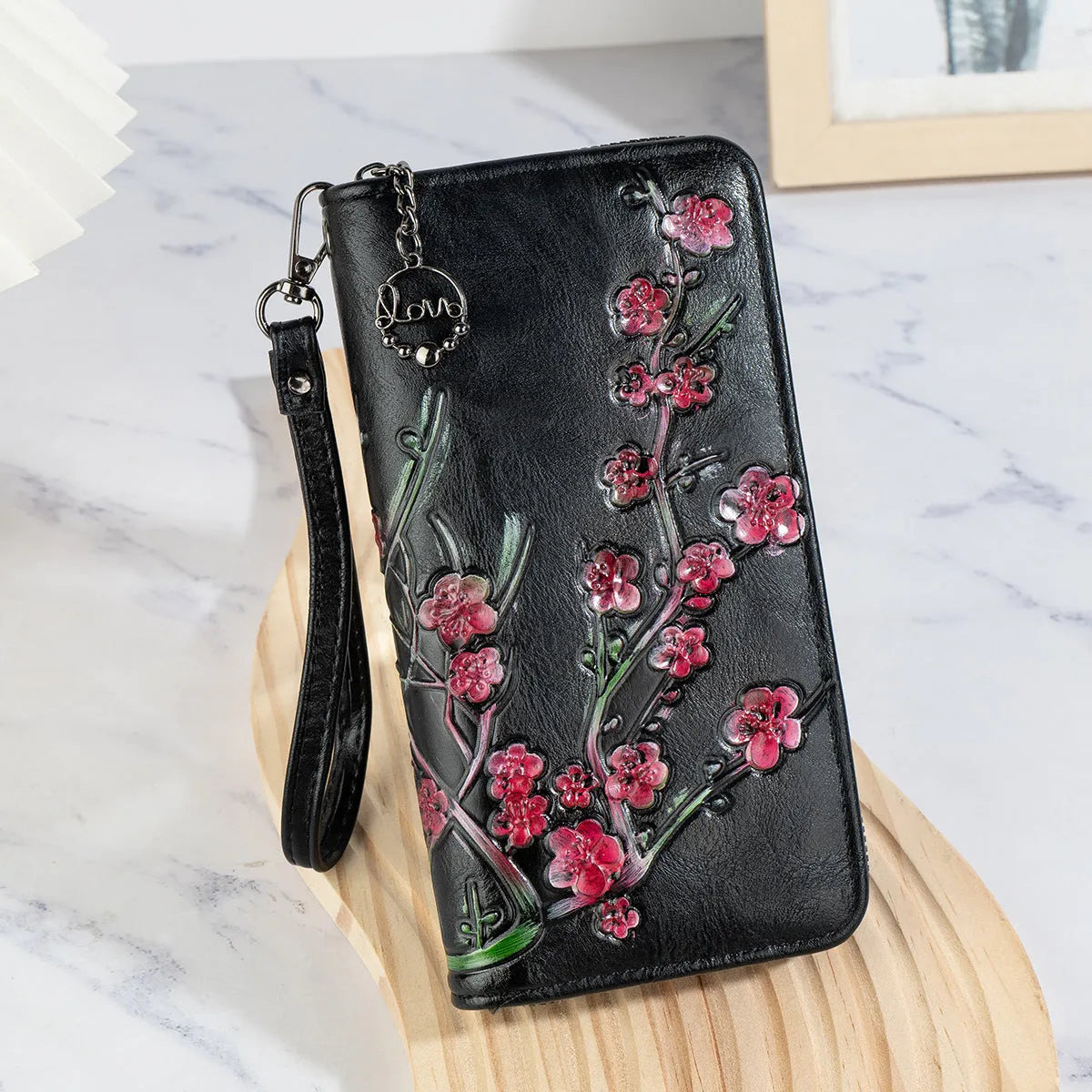 Chinese style floral embossed handbag with hand-painted pattern and zip closure