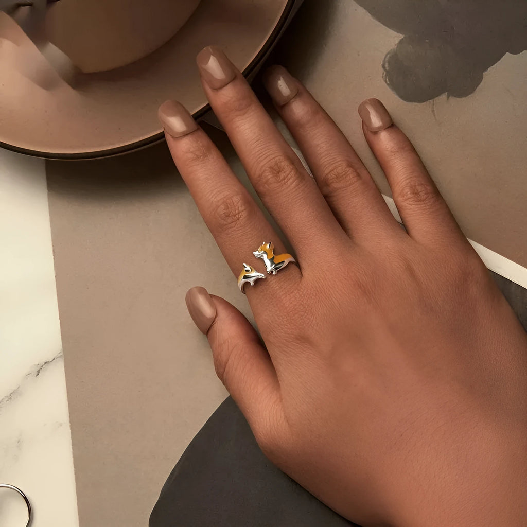 Silver electroplated fashion ring with a cute cartoon corgi dog design on it.