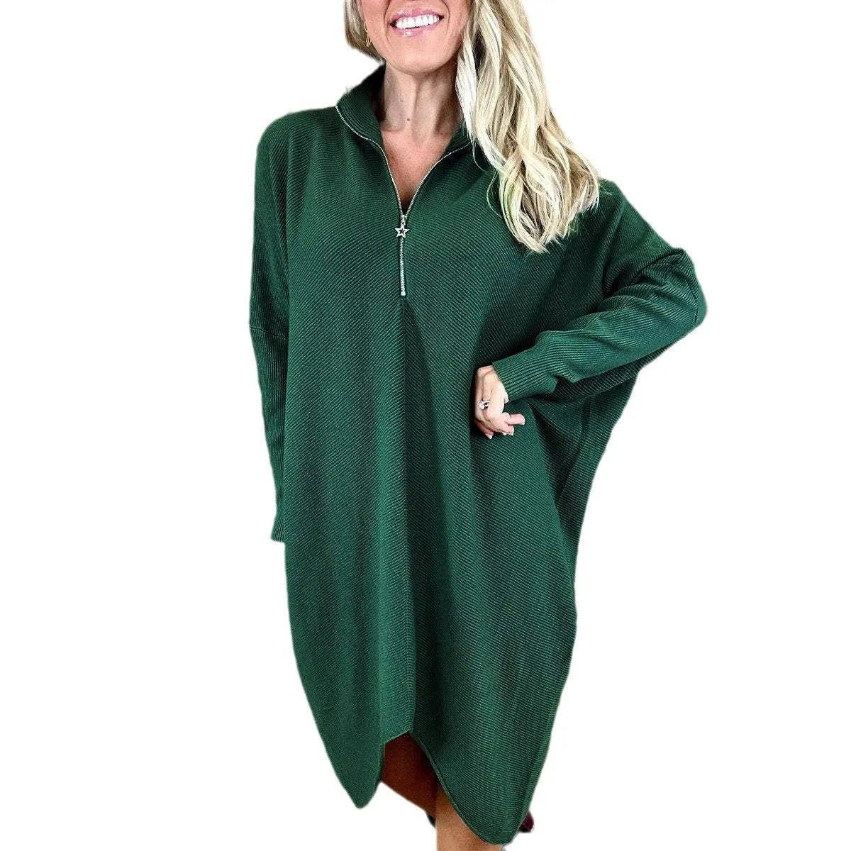Women's solid colour loose knitted dress with raglan sleeves, shown in dark green.