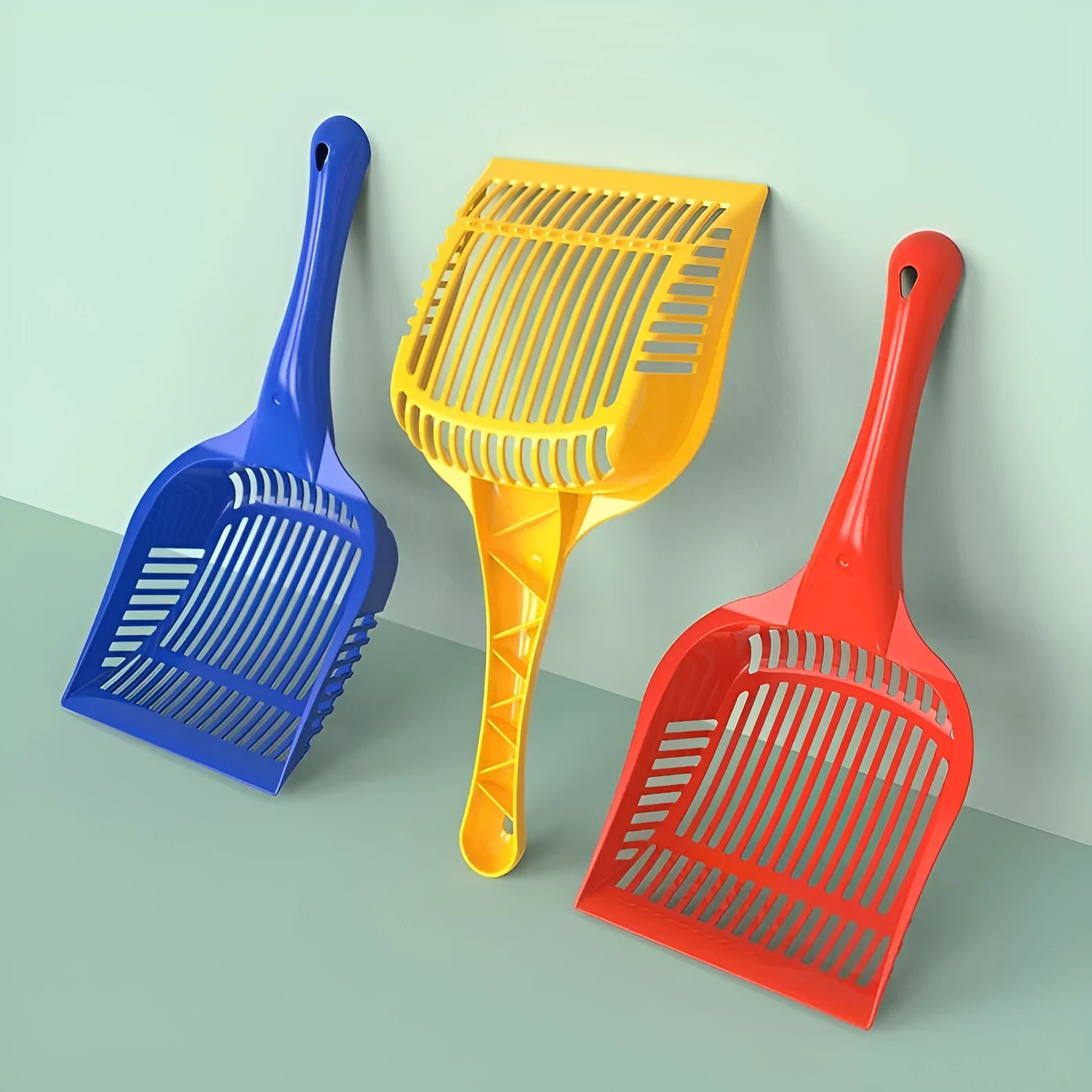 Plastic cat litter scoop in red, yellow or blue, small and medium sizes