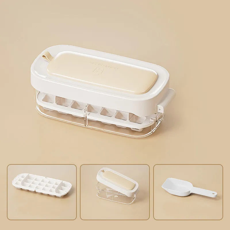 High-capacity ice cube tray in blue with leverage handle and integrated ice shovel storage compartment