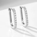 Sterling silver oval zircon ear clips with geometric quadrilateral settings