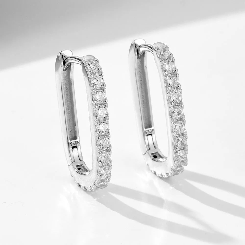 Sterling silver oval zircon ear clips with geometric quadrilateral settings
