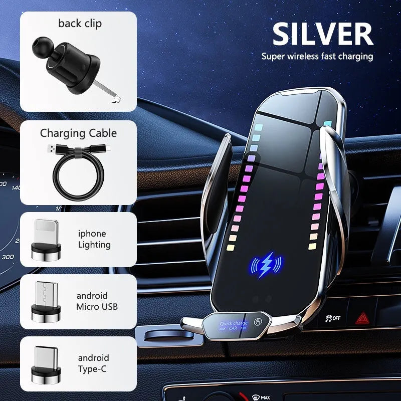 Silver car mobile phone holder with wireless charging dock mounted on a car air vent.