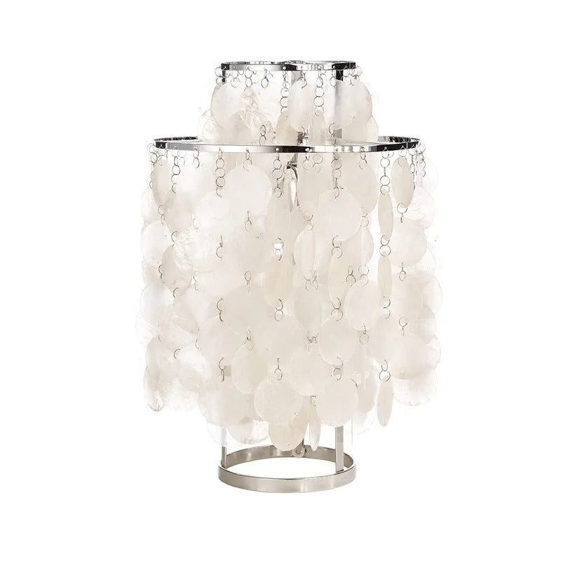 Modern shell design bedside table lamp in chrome or gold finish with slim profile