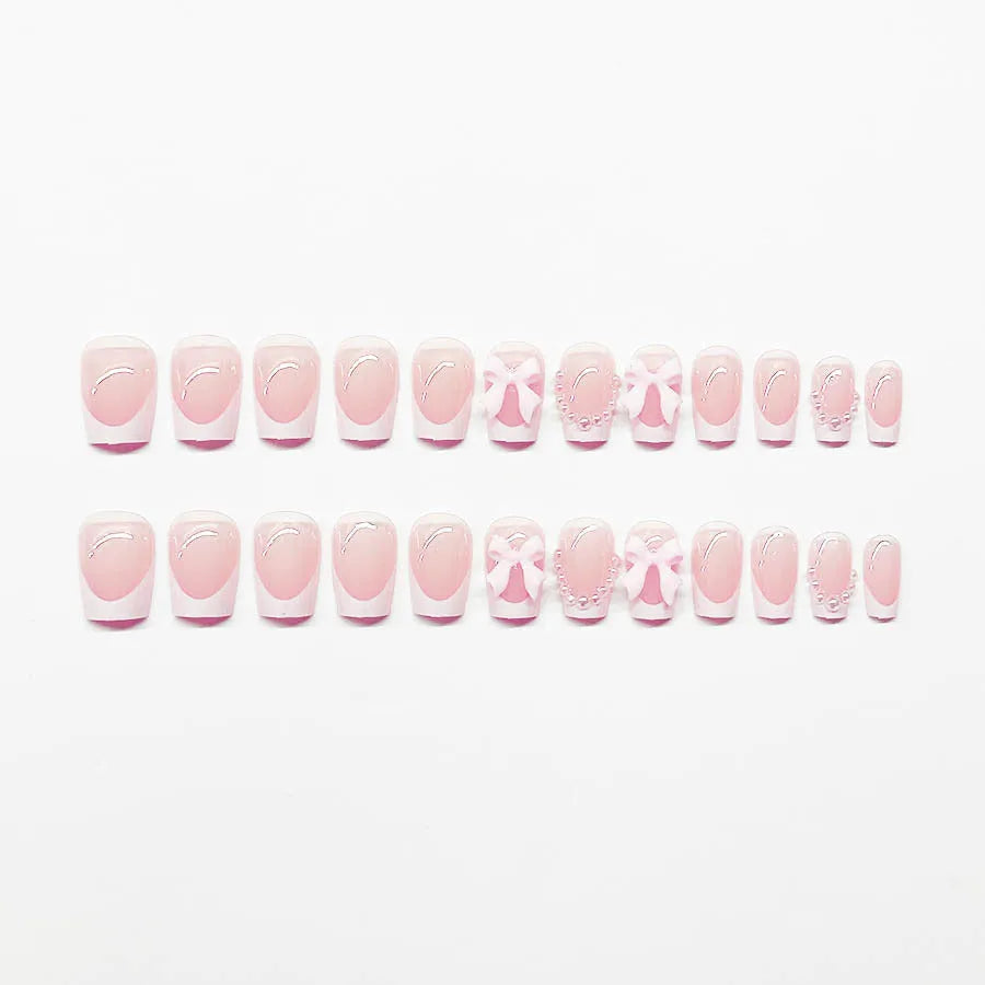 Short French manicure nail art set with bow, tulip, starry sky, and leopard print designs